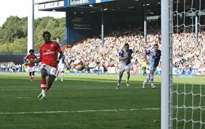 Emmanuel Adebayor shoots past Paul Robinson from the