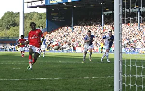 Emmanuel Adebayor shoots past Paul Robinson from
