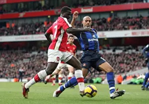 Arsenal V Sunderland 2009-10 Prints: Emmanuel Eboue (Arsenal) Anton Ferdinand (Sunderland). Arsenal 2: 0 Sunderland