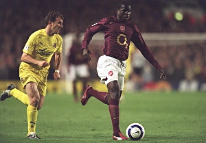 Arsenal v Villarreal 2005-6 Gallery: Emmanuel Eboue (Arsenal) Arruabarrena (Villarreal). Arsenal 1: 0 Villarreal