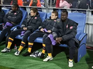 Images Dated 17th September 2008: Emmanuel Eboue on the Arsenal bench before the match