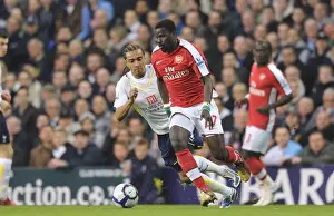 Tottenham Hotspur V Arsenal 2009-10 Prints: Emmanuel Eboue (Arsenal) Benoit Assou-Ekotto (Tottenham). Tottenham Hotspur 2: 1 Arsenal