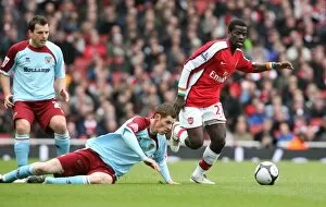 Images Dated 8th March 2009: Emmanuel Eboue (Arsenal) Christian Kalvenes (Burnley)
