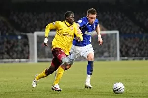Ipswich Town v Arsenal Carling Cup 2010-11 Collection: Emmanuel Eboue (Arsenal) Connor Wickham (Ipswich). Ipswich Town 1: 0 Arsenal