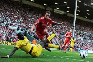 Images Dated 15th August 2010: Emmanuel Eboue (Arsenal) Daniel Agger (Liverpool). Liverpool 1: 1 Arsenal