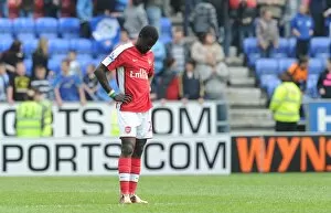 Wigan Athletic v Arsenal 2009-10 Gallery: Emmanuel Eboue (Arsenal) dejected after the match. Wigan Athletic 3: 2 Arsenal