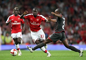 Emmanuel Eboue (Arsenal) Edson Braafheid (Twente)