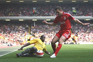 Liverpool v Arsenal 2006-7 Collection: Emmanuel Eboue (Arsenal) Fabio Aurelio (Liverpool)