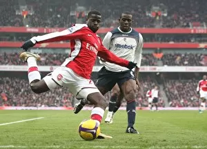 Arsenal v Bolton Wanderers 2008-09 Collection: Emmanuel Eboue (Arsenal) Fabrice Muamba (Bolton)