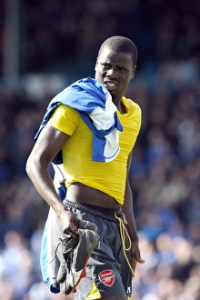 Images Dated 15th May 2007: Emmanuel Eboue (Arsenal) gives his boots to a fan after the match