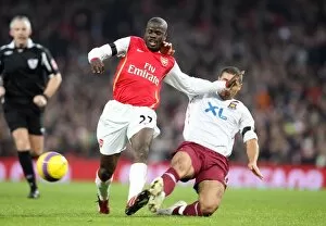 Arsenal v West Ham United 2007-8 Collection: Emmanuel Eboue (Arsenal) Hayden Mullins (West Ham)
