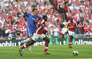 Arsenal v Chelsea FA Cup 2008-09 Collection: Emmanuel Eboue (Arsenal) John Terry (Chelsea)