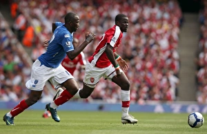 Emmanuel Eboue (Arsenal) John Utaka (Portsmouth)