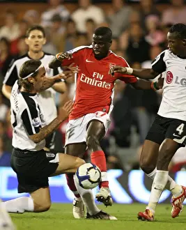 Fulham V Arsenal 2009-10 Prints: Emmanuel Eboue (Arsenal) Jonathan Greening and John Pantsil (Fulham)