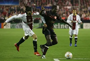 Seville V Arsenal 2007-8 Prints: Emmanuel Eboue (Arsenal) Jose Angel Crespo (Seville)