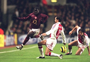 Arsenal v Ajax 2005-6 Collection: Emmanuel Eboue (Arsenal) Juanfran (Ajax). Arsenal 0: 0 Ajax