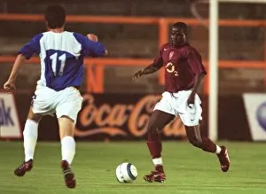Images Dated 22nd September 2005: Emmanuel Eboue (Arsenal) Kyle Swane (Portsmouth)
