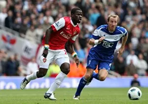 Images Dated 16th October 2010: Emmanuel Eboue (Arsenal) Lee Bowyer (Birmingham). Arsenal 2: 1 Birmingham City