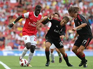 Emmanuel Eboue (Arsenal) Mathieu Flamini and Luca Antonini (Milan). Arsenal 1: 1 AC Milan