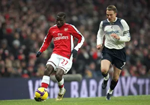 Arsenal v Bolton Wanderers 2008-09 Collection: Emmanuel Eboue (Arsenal) Matt Taylor (Bolton)