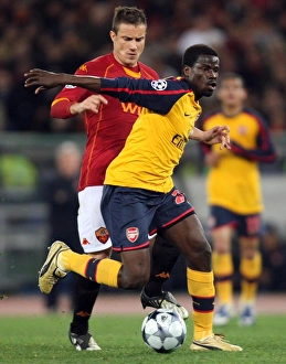 Emmanuel Eboue (Arsenal) Matteo Brighi (Roma)