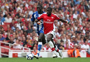 Emmanuel Eboue (Arsenal) Mohamed Diame (Wigan)