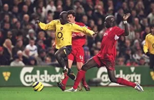 Liverpool v Arsenal 2005-6 Collection: Emmanuel Eboue (Arsenal) Momo Sissoko (Liverpool). Liverpool 1: 0 Arsenal