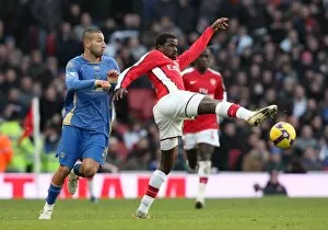 Images Dated 28th December 2008: Emmanuel Eboue (Arsenal) Nadir Belhadj (Portsmouth)