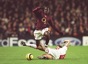 Arsenal v Ajax 2005-6 Collection: Emmanuel Eboue (Arsenal) Nourdin Boukhari (Ajax). Arsenal 0: 0 Ajax
