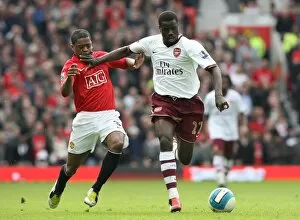 Images Dated 14th April 2008: Emmanuel Eboue (Arsenal) Patrice Evra (Manchester United)