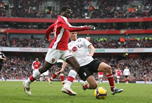 Arsenal v Fulham 2008-9 Gallery: Emmanuel Eboue (Arsenal) Paul Konchesky (Fulham)