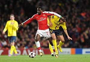 Images Dated 31st March 2010: Emmanuel Eboue (Arsenal) Sergio Busquets (Barcelona). Arsenal 2: 2 Barcelona