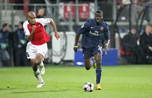 Emmanuel Eboue (Arsenal) Simon Poulsen (AZ Alkmaar)