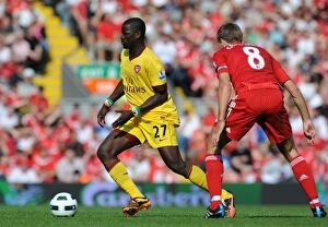 Images Dated 15th August 2010: Emmanuel Eboue (Arsenal) Steven Gerrard (Liverpool). Liverpool 1: 1 Arsenal
