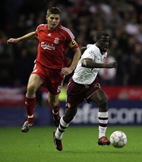 Images Dated 9th April 2008: Emmanuel Eboue (Arsenal) Steven Gerrard (Liverpool)