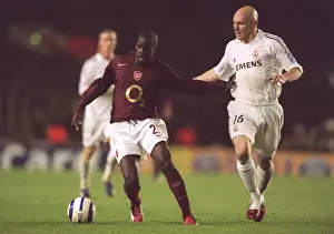 Arsenal V Real Madrid 2005-6 Prints: Emmanuel Eboue (Arsenal) Thomas Gravesen (Real Madrid)