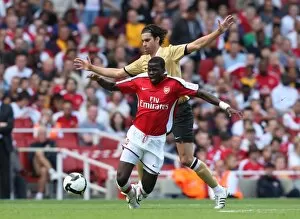 Emmanuel Eboue (Arsenal) Tiago (Juve)