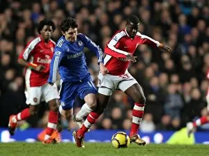 Chelsea v Arsenal 2009-2010 Collection: Emmanuel Eboue (Arsenal) Yury Zhirkov (Chelsea). Chelsea 2: 0 Arsenal. Barclays Premier League