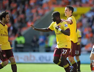 Emmanuel Eboue celebrates scoring the 2nd Arsenal goal with Robin van Persie
