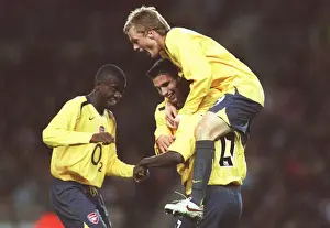 Emmanuel Eboue celebrates scoring Arsenals 1st goal with Sebastian Larsson