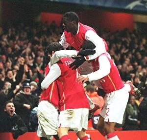 Arsenal v Hamburg 2006-07 Collection: Emmanuel Eboue celebrates scoring Arsenals 2nd goal with Cesc Fabregas