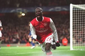 Images Dated 21st November 2006: Emmanuel Eboue celebrates scoring Arsenals 2nd goal