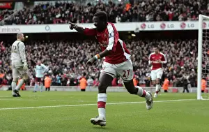 Emmanuel Eboue celebrates scoring Arsenals 3rd goal
