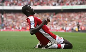 Emmanuel Eboue celebrates scoring Arsenals 3rd goal