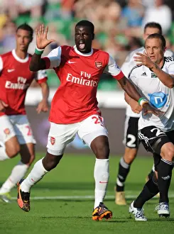 Legia Warsaw V Arsenal 2010-11 Prints: Emmanuel Eboue vs. Srda Knezevic: Arsenal's Triumph over Legia Warsaw (5-6)
