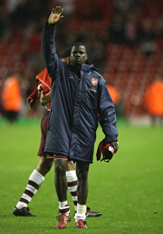 Liverpool v Arsenal 2007-8 Collection: Emmanuel Eboue waves to the Arsenal fans after the match