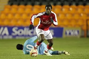 Images Dated 9th March 2009: Emmanuel Frimpong (Arsenal) Ahmed Abdulla (West Ham)
