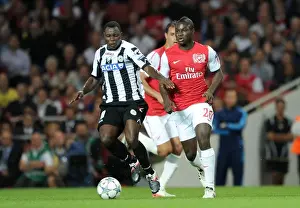 Arsenal V Udinese 2011-12 Prints: Emmanuel Frimpong (Arsenal) Kwadwo Asamoah (Udinese). Arsenal 1: 0 Udinese