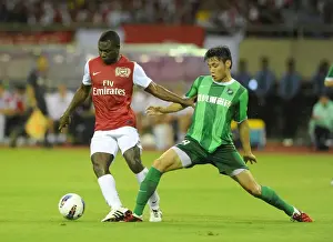 Hangzhou Greentown V Arsenal Prints: Emmanuel Frimpong vs. Tang Jiashu: Clash in the Far East (Hangzhou Greentown vs. Arsenal)