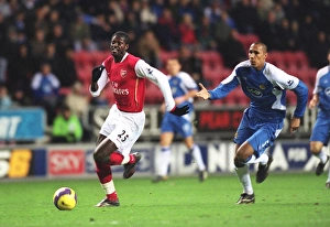 Wigan Athletic v Arsenal 2006-07 Gallery: Emmauel Adebayor (Arsenal) Emmerson Boyce (Wigan)